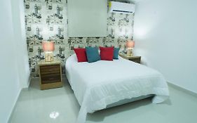 Malecon Rooms y Hotel